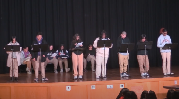 Theatre students do onstage reading about gun violence